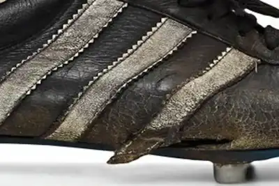 Golf and tension in Russia hurt adidas
