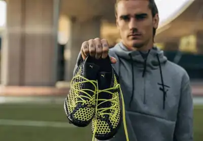 Kering to offer Puma shares to investors instead of a cash dividend