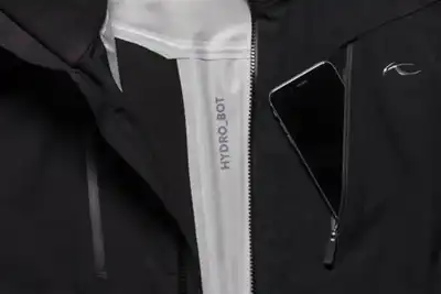 KJUS tech jacket manages moisture with the touch of a button