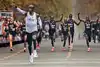 Shoes help Kipchoge smash barrier