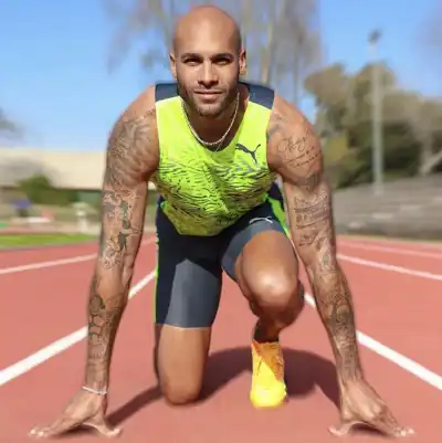 Puma snaps up Olympic 100 metres champion