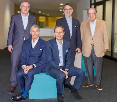 Rudolf revamps management structure