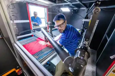 Automated pre-processing device for post-consumer clothing